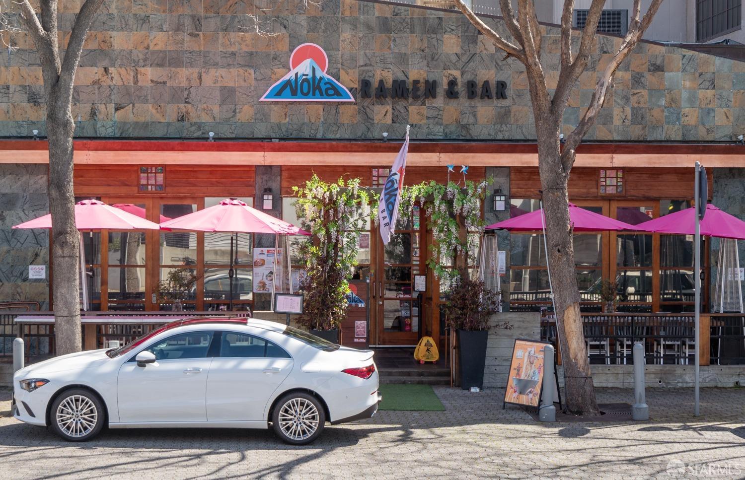 288 3rd Street, Unit 201 Oakland, CA 94607 - Photo 33 of 51 a car parked in front of a building
