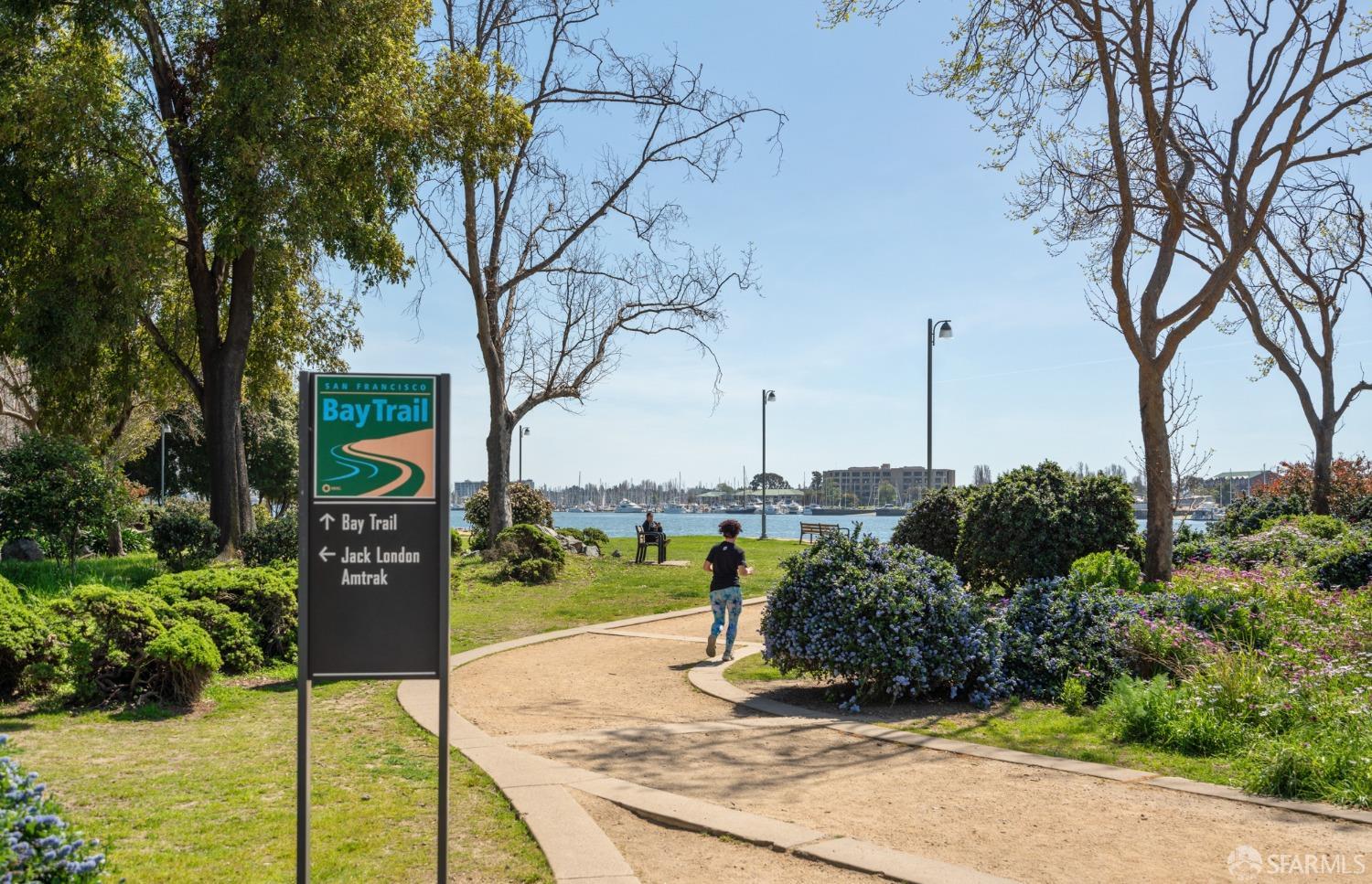 288 3rd Street, Unit 201 Oakland, CA 94607 - Photo 51 of 51 a street sign on a sidewalk next to a road