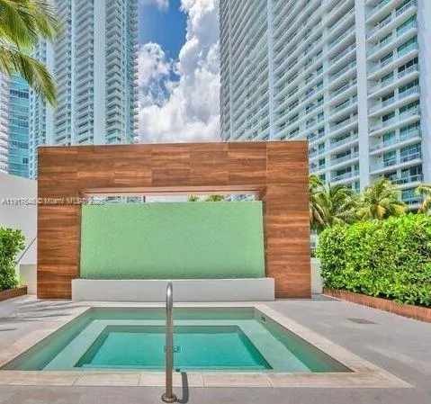 a view of swimming pool from a balcony