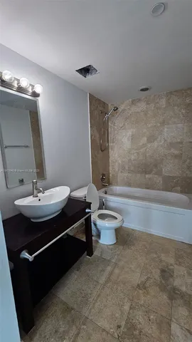 a utility room with a sink