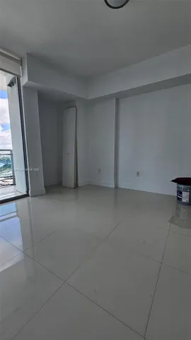 a view of a balcony with chairs