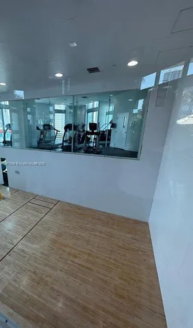 a view of a swimming pool in front of a building