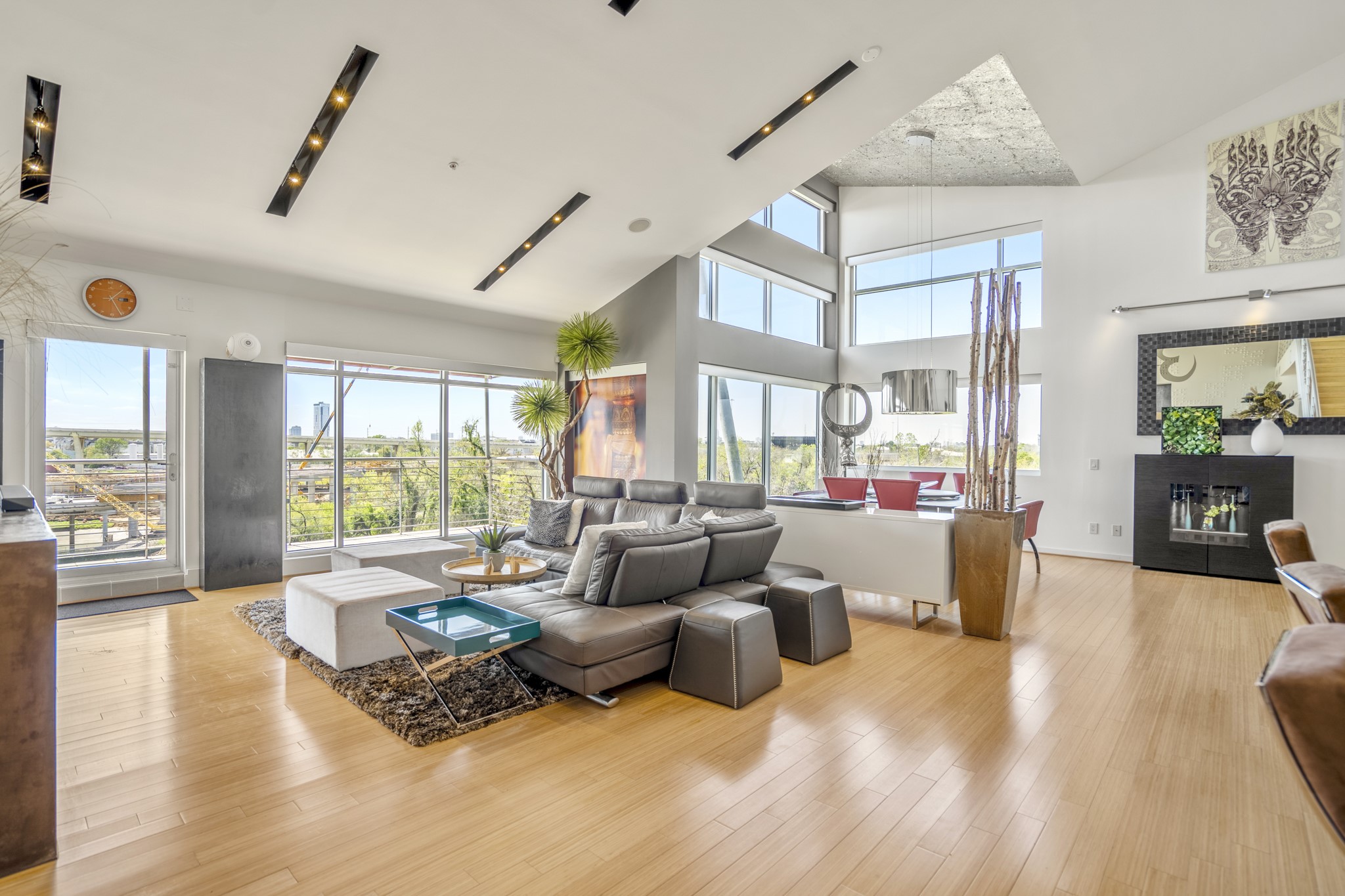 102 Quitman Street, Unit 405 Houston, TX 77009 - Photo 11 of 46 a living room with furniture and a large window