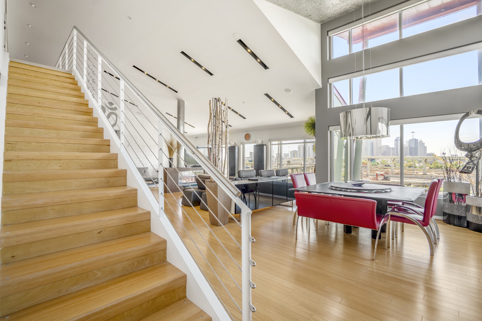 102 Quitman Street, Unit 405 Houston, TX 77009 - Photo 15 of 46 a view of entryway dining room and hall with wooden floor