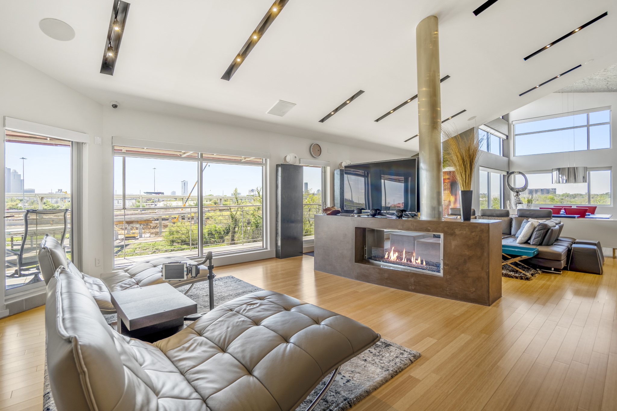 102 Quitman Street, Unit 405 Houston, TX 77009 - Photo 17 of 46 a living room with furniture fireplace and a large window