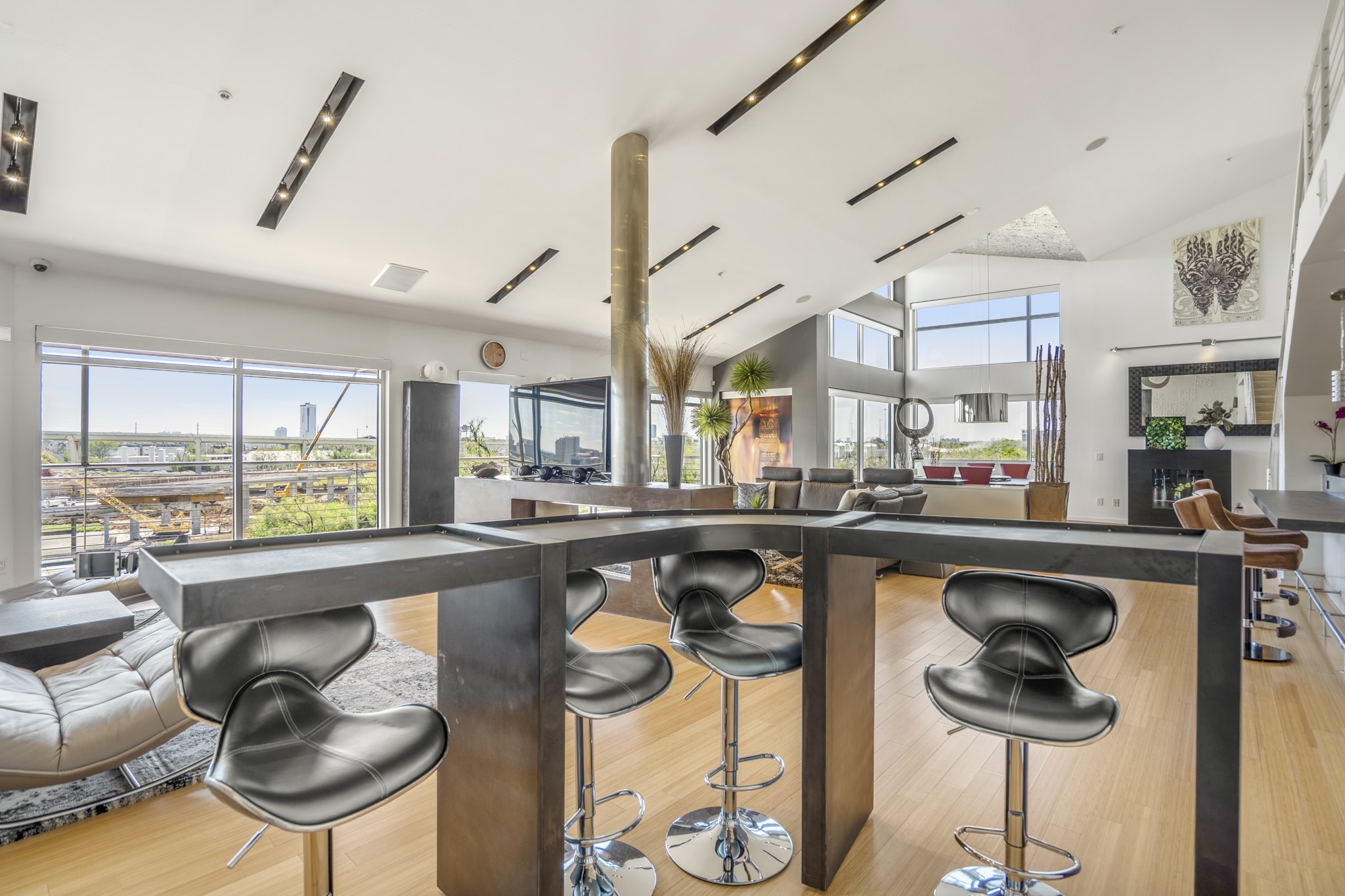 102 Quitman Street, Unit 405 Houston, TX 77009 - Photo 19 of 46 a kitchen with stainless steel appliances granite countertop a sink a stove and a refrigerator