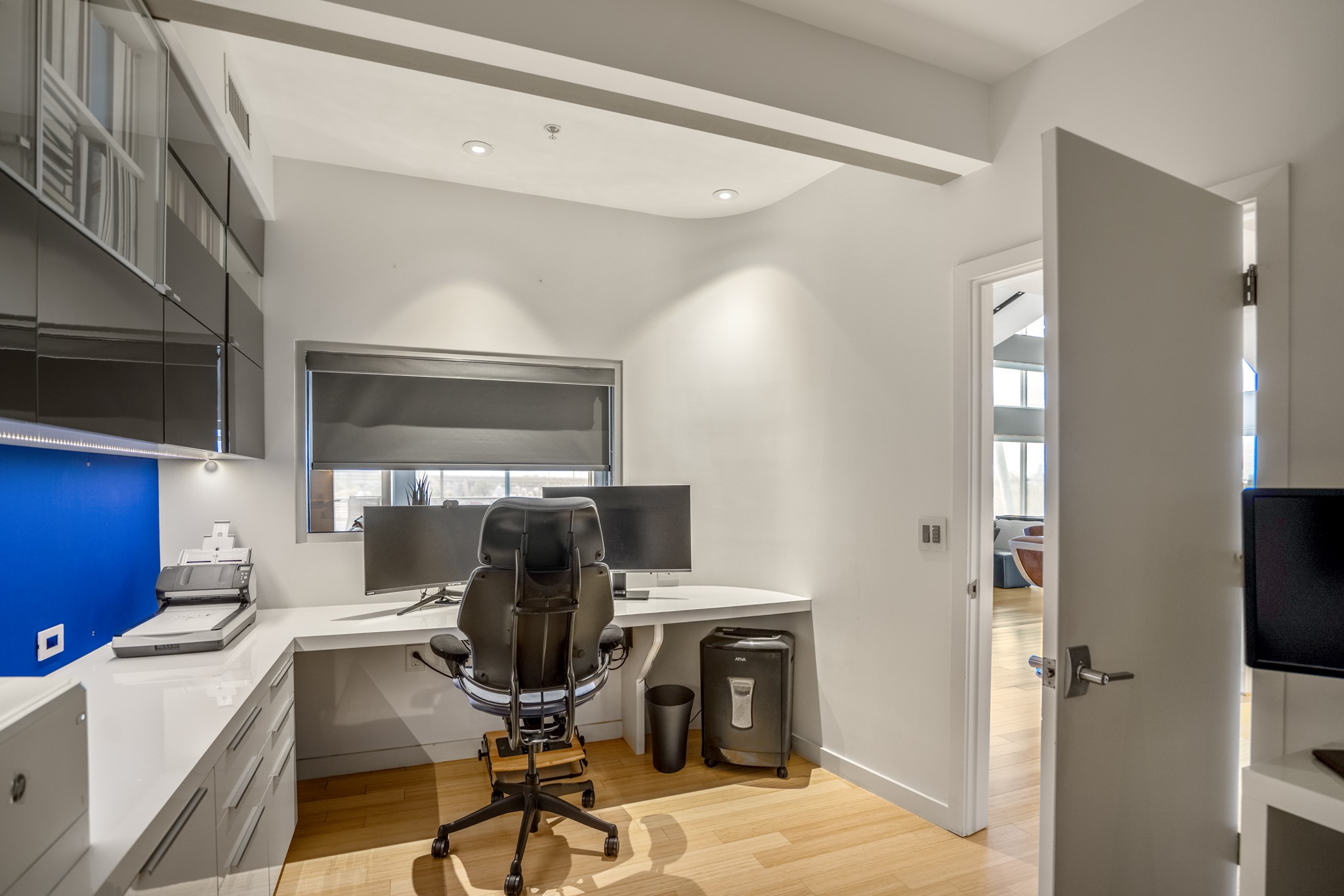102 Quitman Street, Unit 405 Houston, TX 77009 - Photo 21 of 46 a view of a workspace with furniture and a window