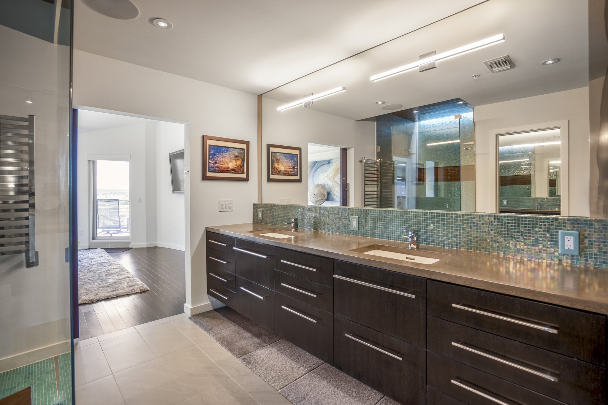 102 Quitman Street, Unit 405 Houston, TX 77009 - Photo 23 of 46 a spacious bathroom with a granite countertop sink a mirror and a