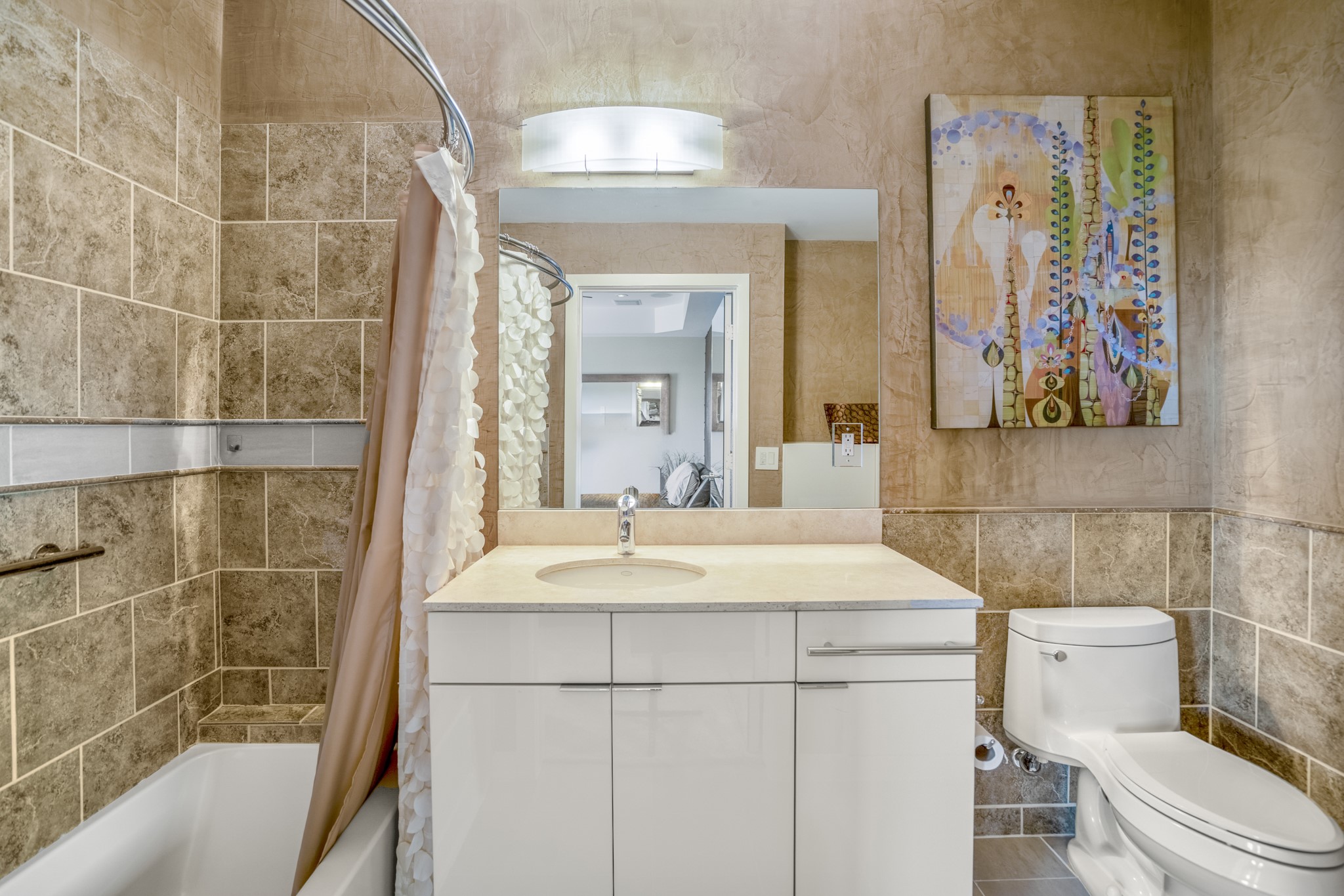 102 Quitman Street, Unit 405 Houston, TX 77009 - Photo 30 of 46 a bathroom with a sink a toilet and shower