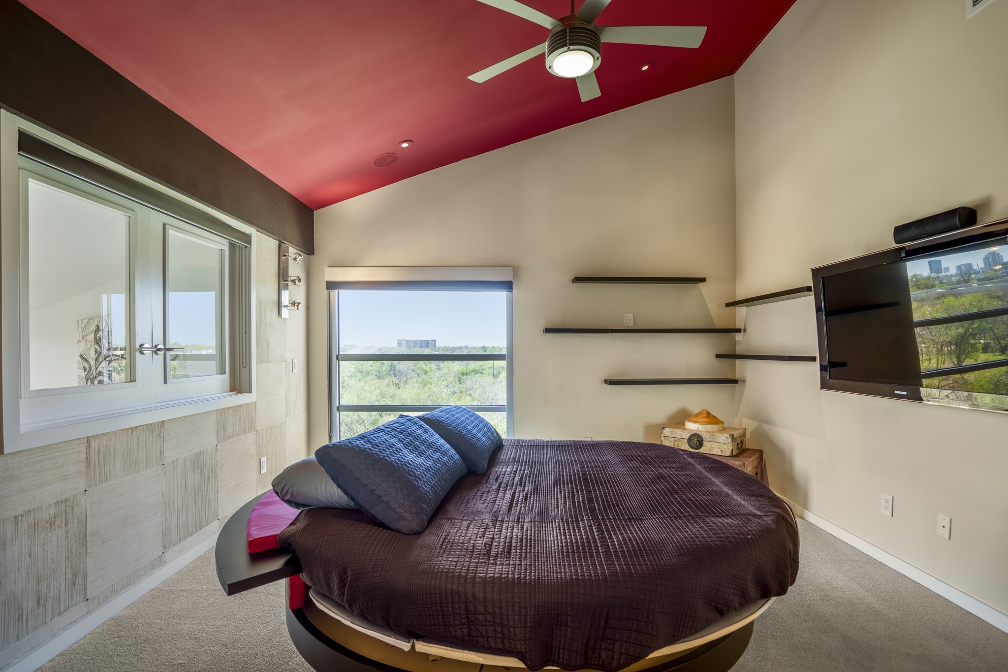 102 Quitman Street, Unit 405 Houston, TX 77009 - Photo 31 of 46 a bedroom with a bed and window