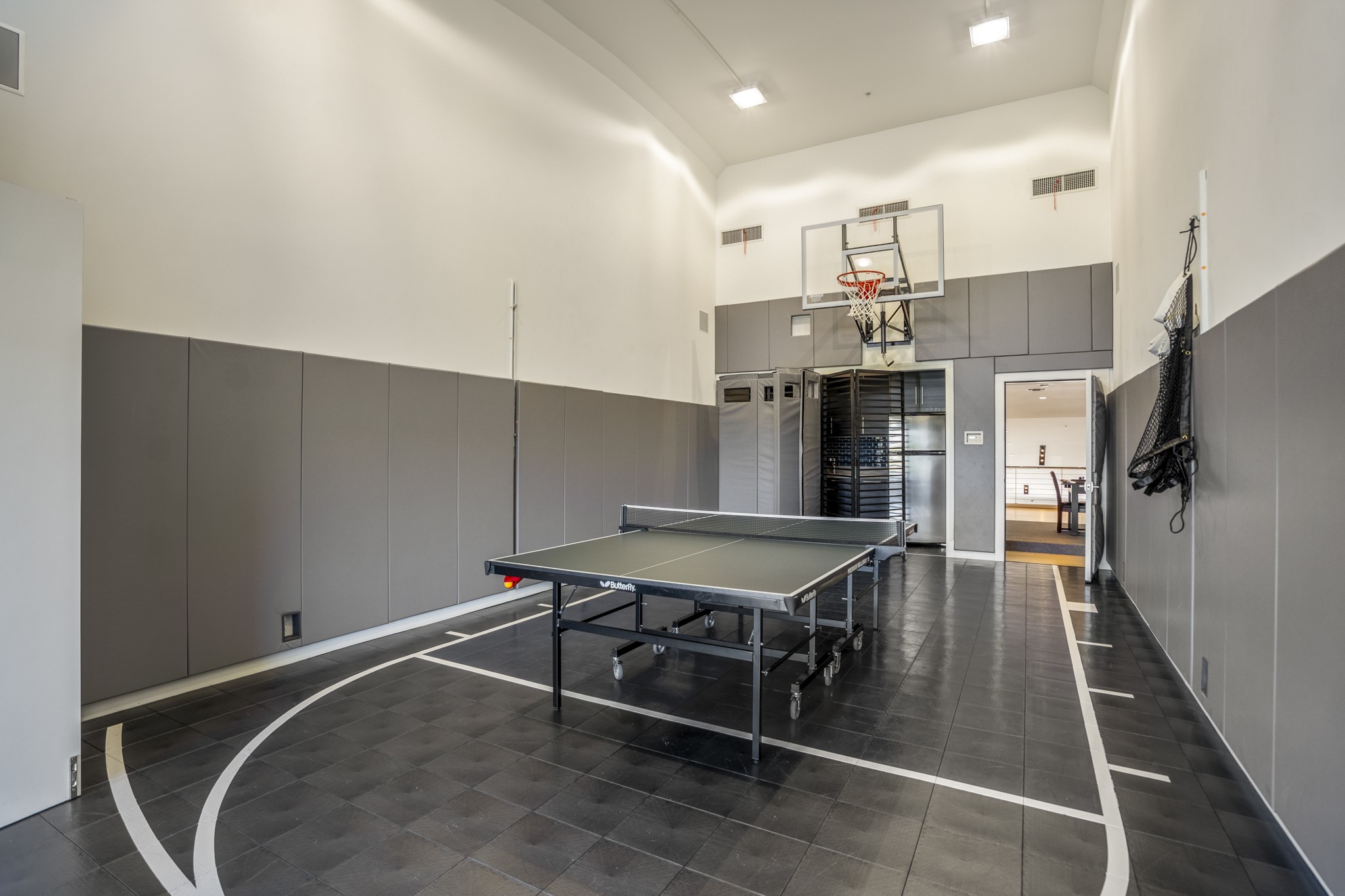 102 Quitman Street, Unit 405 Houston, TX 77009 - Photo 37 of 46 an open kitchen with a table and chairs