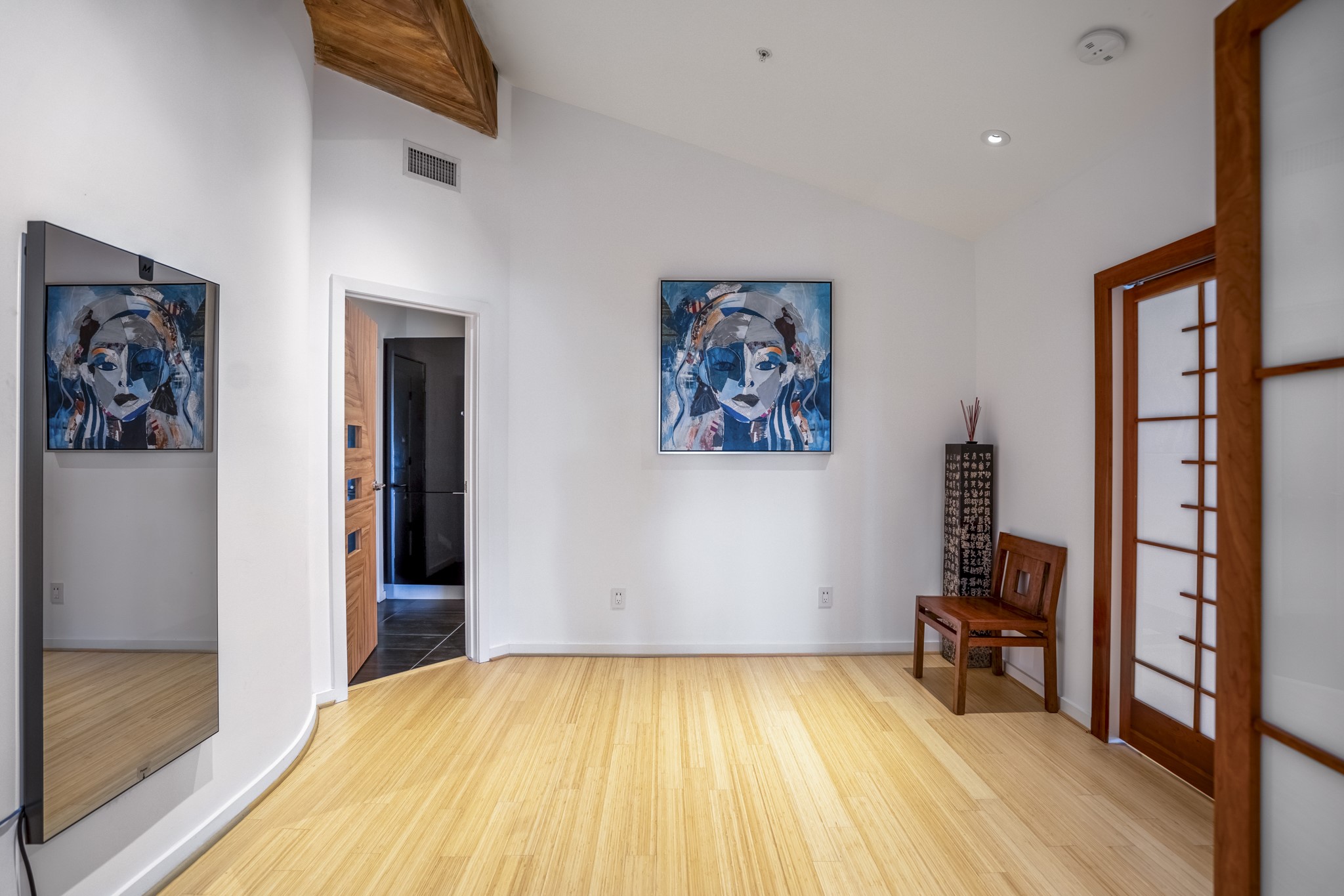 102 Quitman Street, Unit 405 Houston, TX 77009 - Photo 43 of 46 a view of a bedroom with workspace and a window