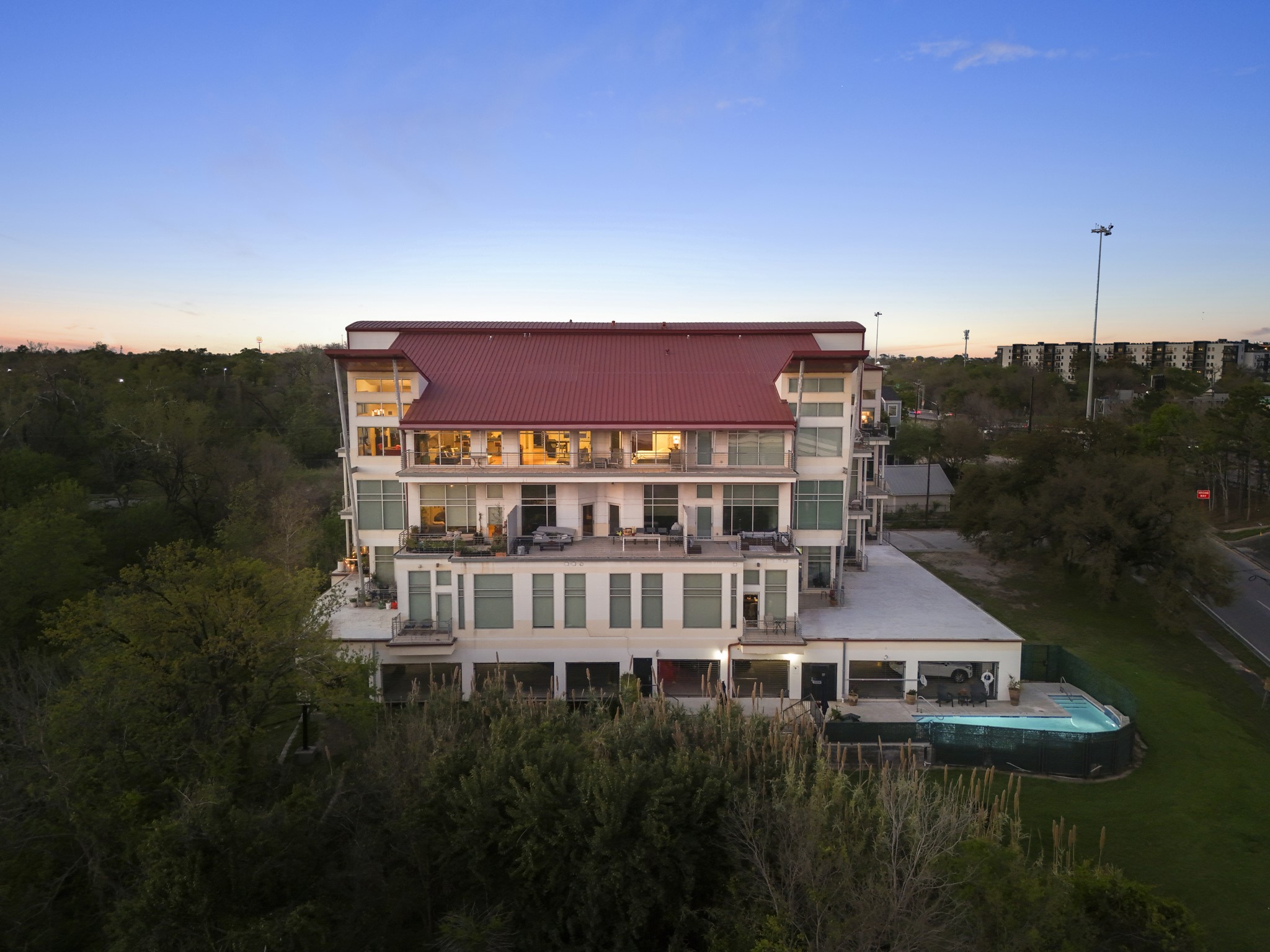 102 Quitman Street, Unit 405 Houston, TX 77009 - Photo 45 of 46 a view of a large building with a yard
