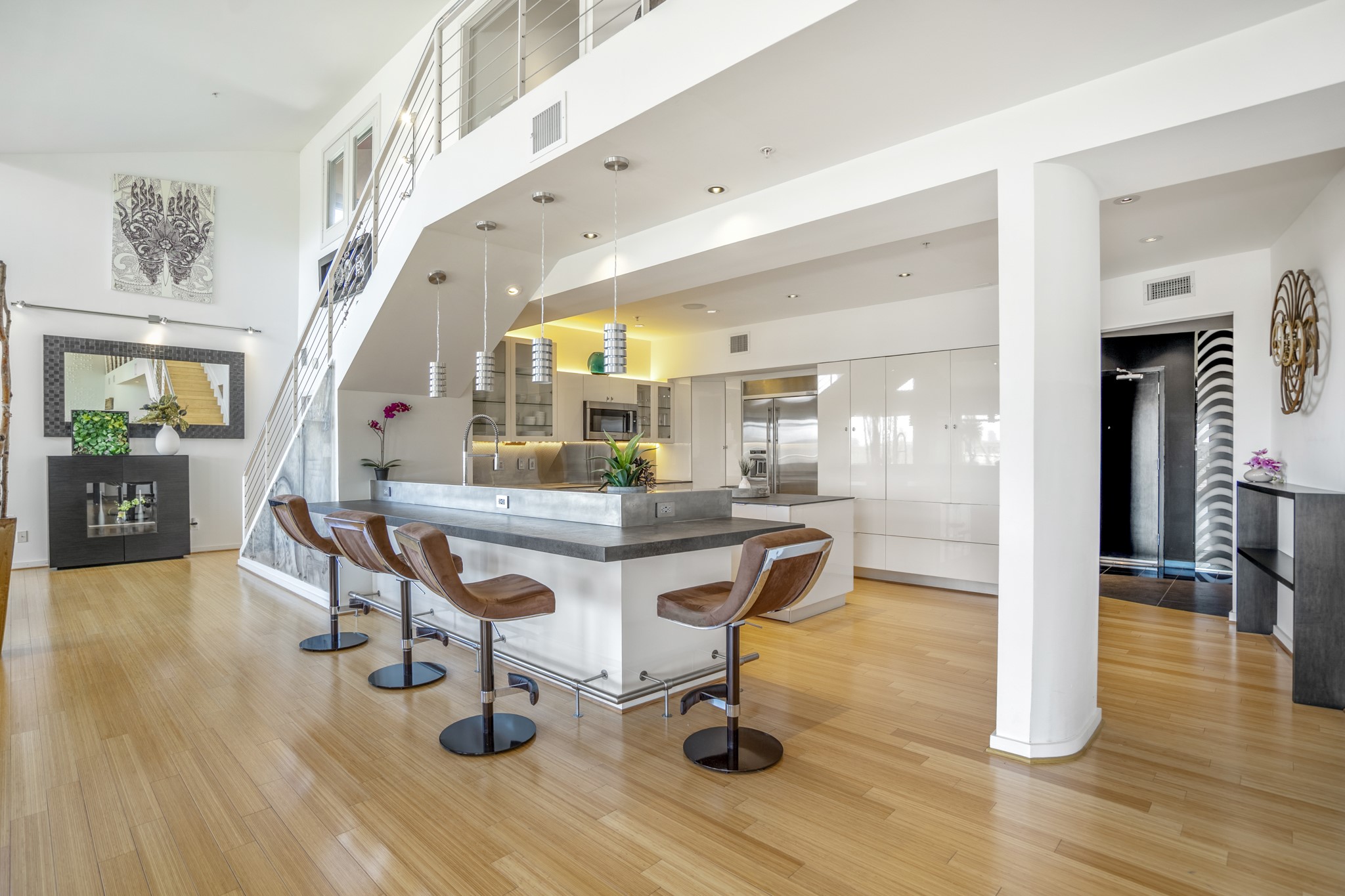 102 Quitman Street, Unit 405 Houston, TX 77009 - Photo 9 of 46 a view of a dining room with furniture and wooden floor