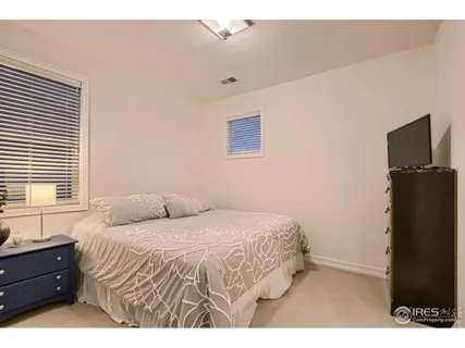 a view of a golf course with a ocean view