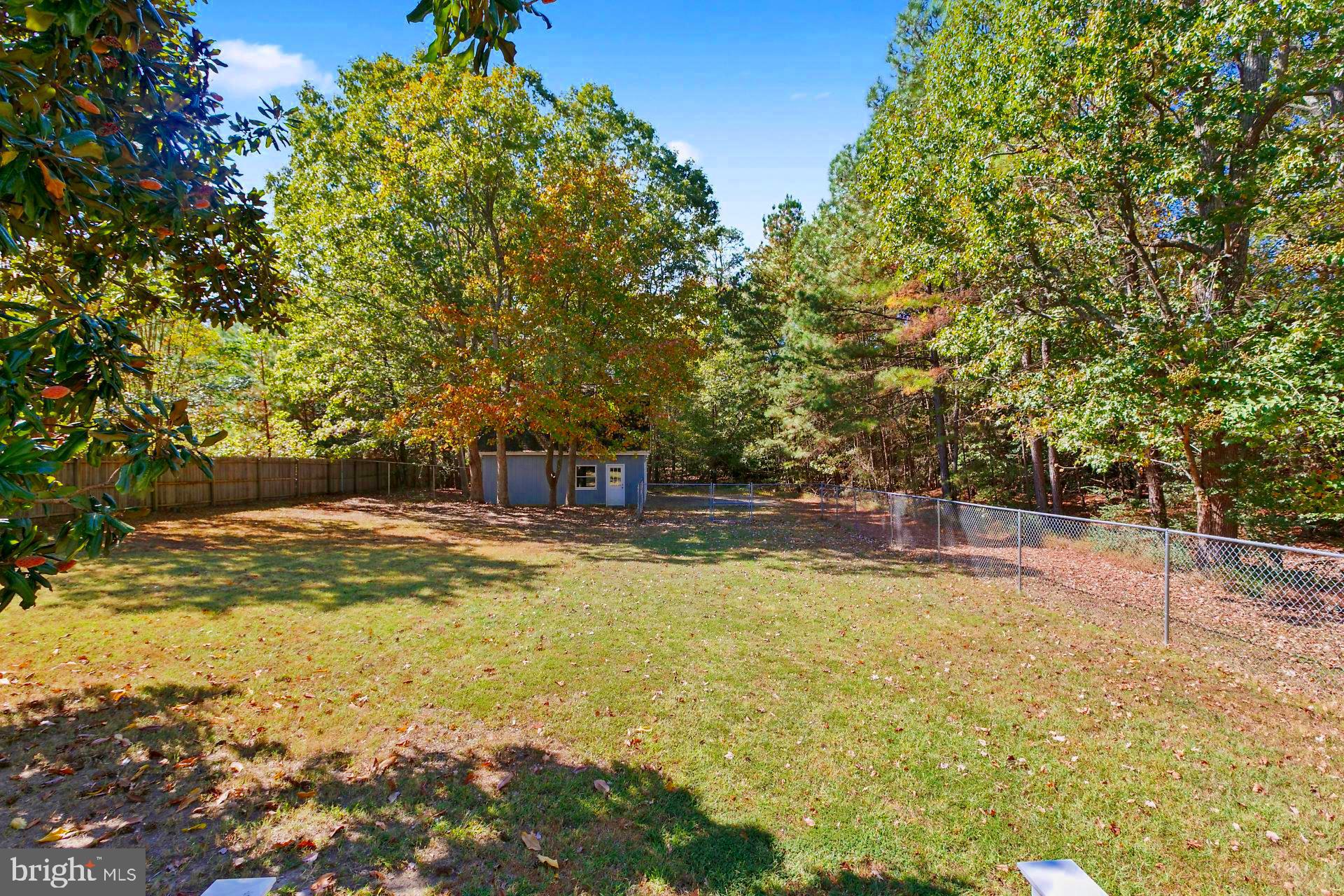 18515 Three Notch Road Lexington Park, MD 20653 - Photo 18 of 34 Large, Level Fenced In Lot Leads to Garage Space