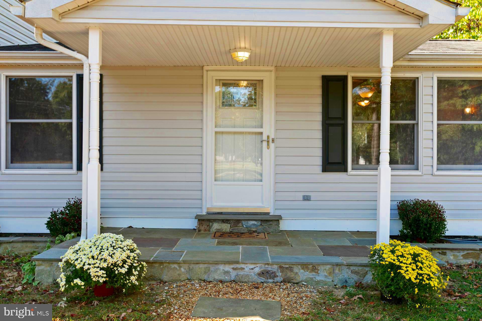 18515 Three Notch Road Lexington Park, MD 20653 - Photo 4 of 34 Welcoming Slate Front Porch