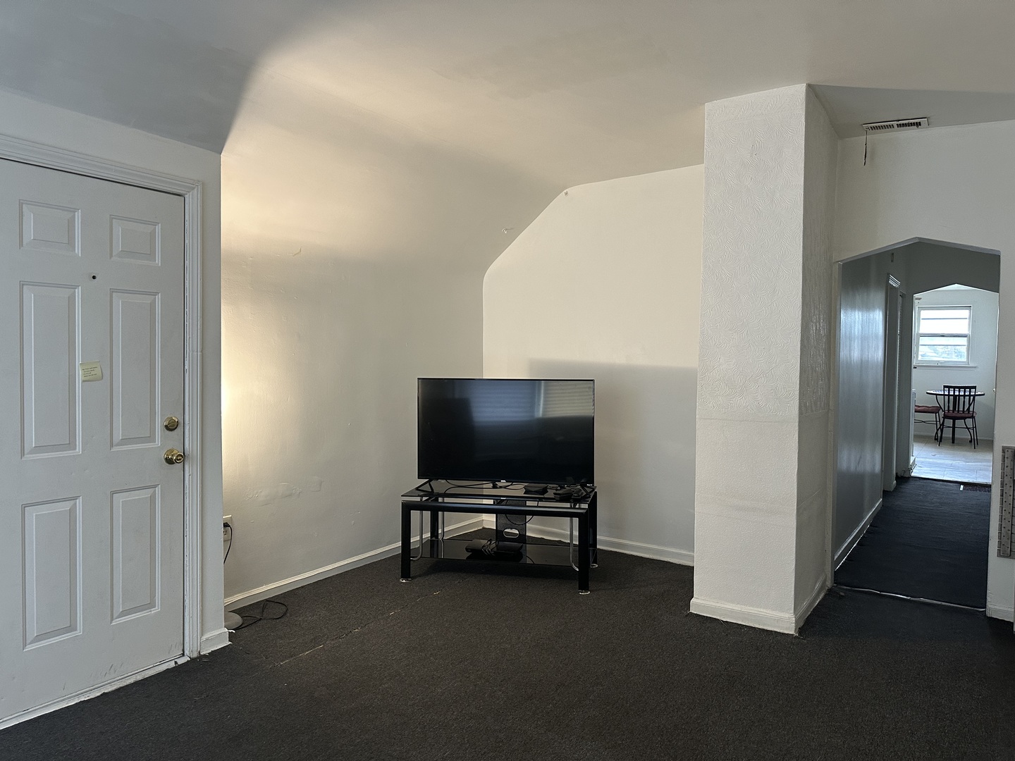 7710 South Ada Street, Unit 2 Chicago, IL 60620 - Photo 2 of 10 a view of room with furniture and wooden floor