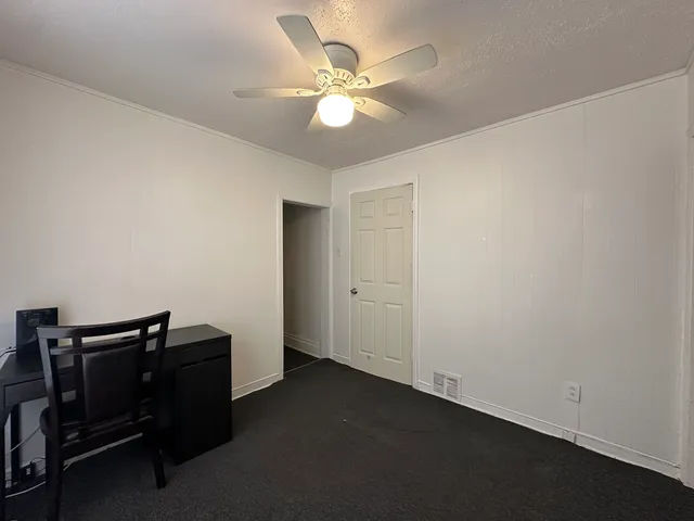 a view of workspace with cabinet
