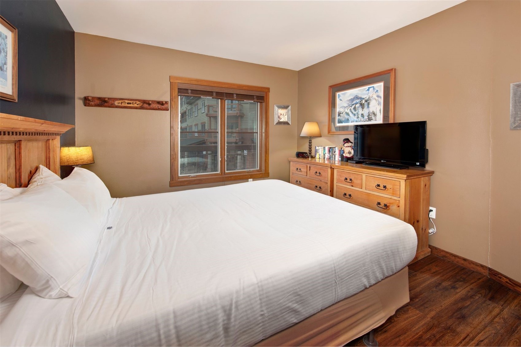 129 River Run Road, Unit 8040 Keystone, CO 80435 - Photo 15 of 50 Bedroom featuring dark wood-style floors and baseboards