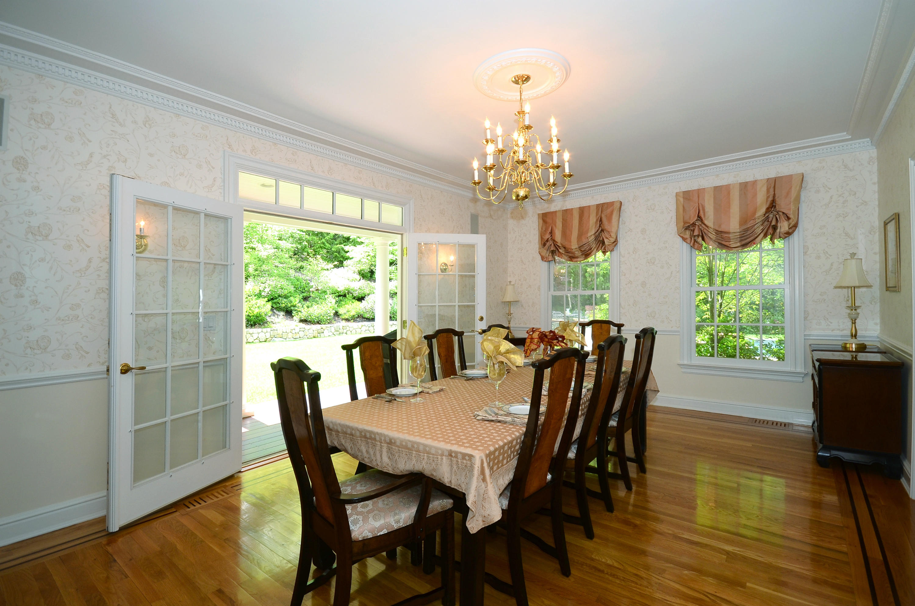 658 Valley Road New Canaan, CT 06840 - Photo 19 of 23 a view of a dining room with furniture window and outside view