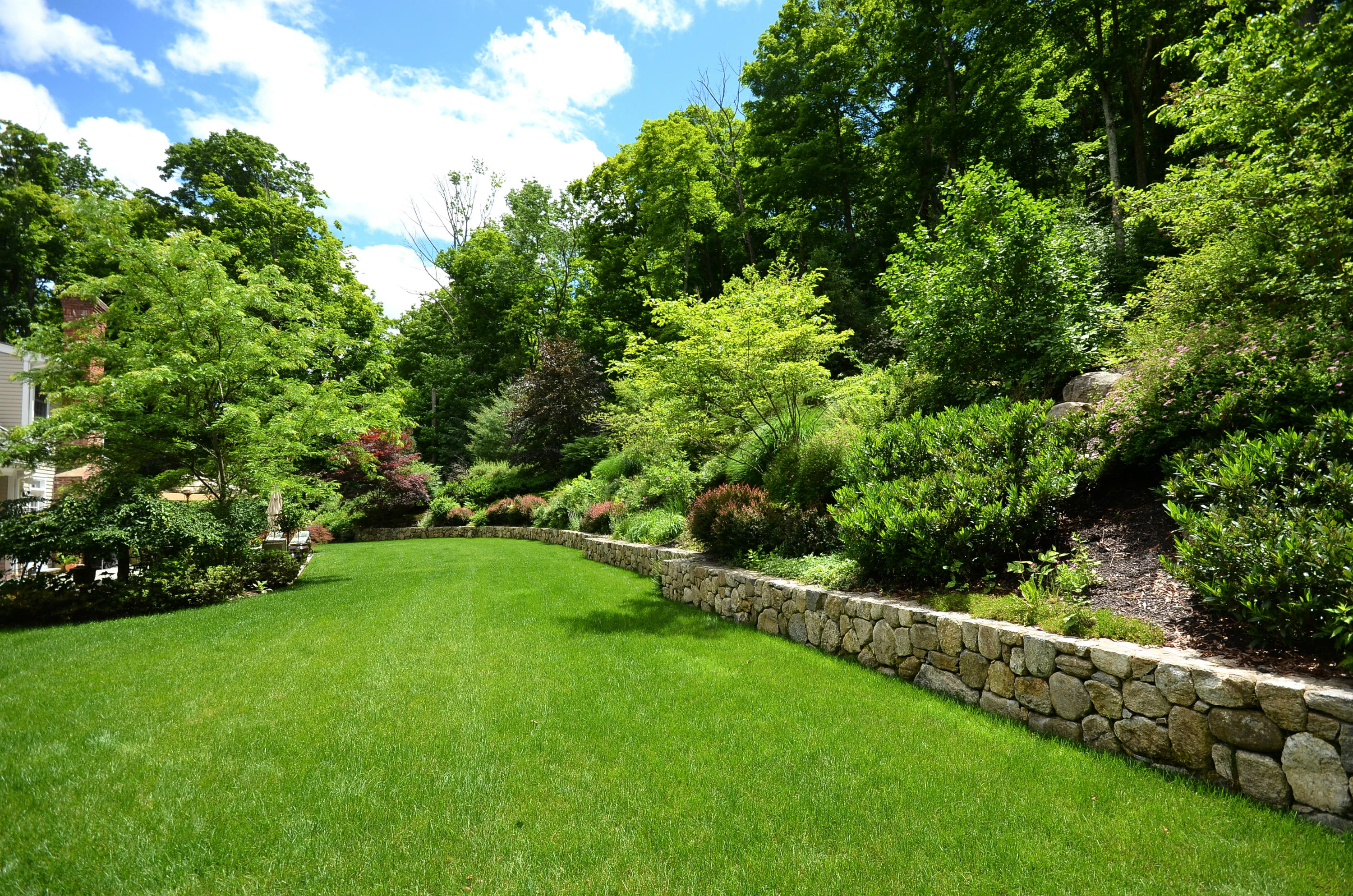 658 Valley Road New Canaan, CT 06840 - Photo 9 of 23 a view of an outdoor space and a yard