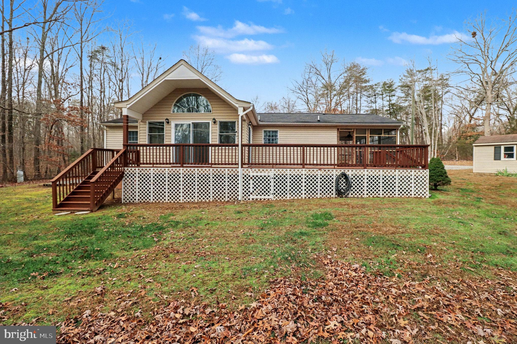 259 Hawkins Farm Road Bumpass, VA 23024 - Photo 19 of 24 a view of a back yard