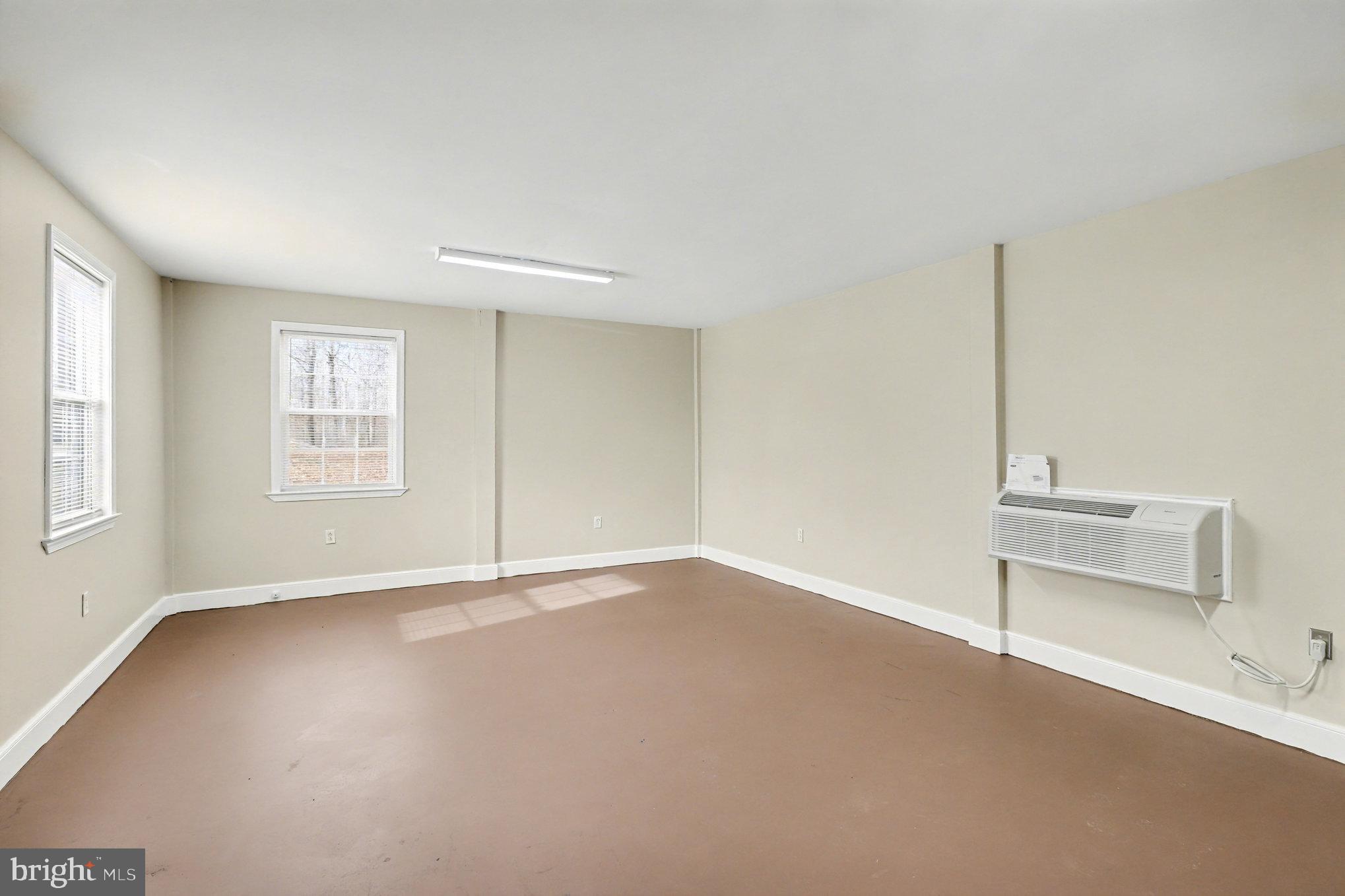 259 Hawkins Farm Road Bumpass, VA 23024 - Photo 22 of 24 a view of an empty room with a window