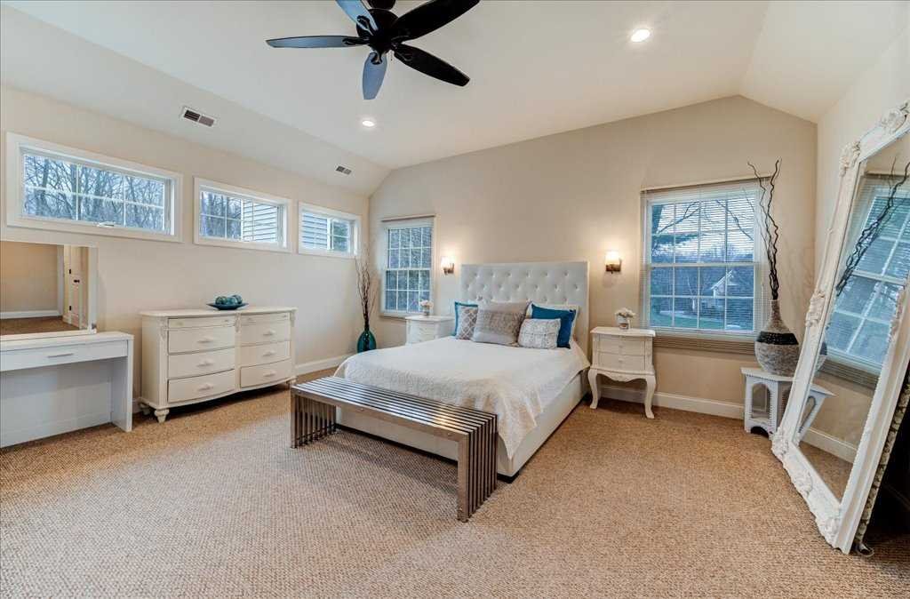 107 Roundhill Road East Fishkill, NY 12533 - Photo 21 of 38 a spacious bedroom with a bed and a dresser