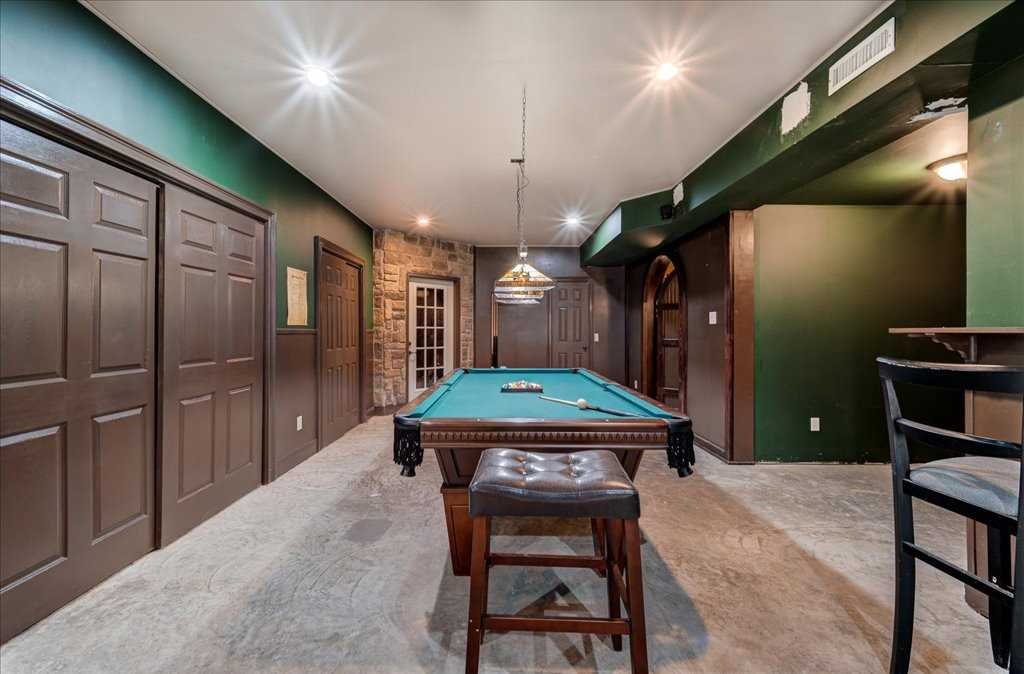 107 Roundhill Road East Fishkill, NY 12533 - Photo 29 of 38 a room with furniture and a chandelier
