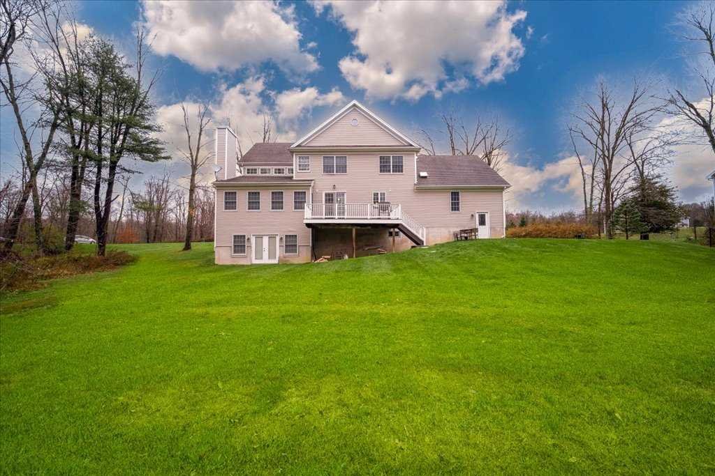 107 Roundhill Road East Fishkill, NY 12533 - Photo 35 of 38 a view of a house with a big yard