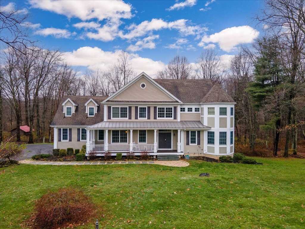 107 Roundhill Road East Fishkill, NY 12533 - Photo 38 of 38 a front view of a house with garden