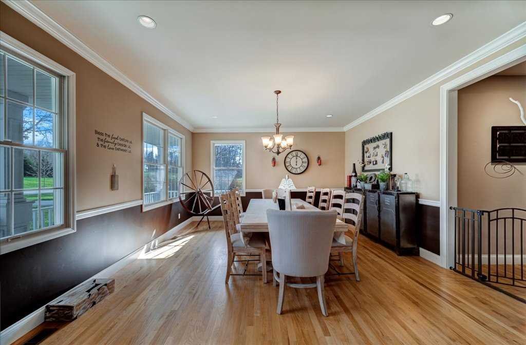 107 Roundhill Road East Fishkill, NY 12533 - Photo 7 of 38 a view of a dining room with furniture window and wooden floor