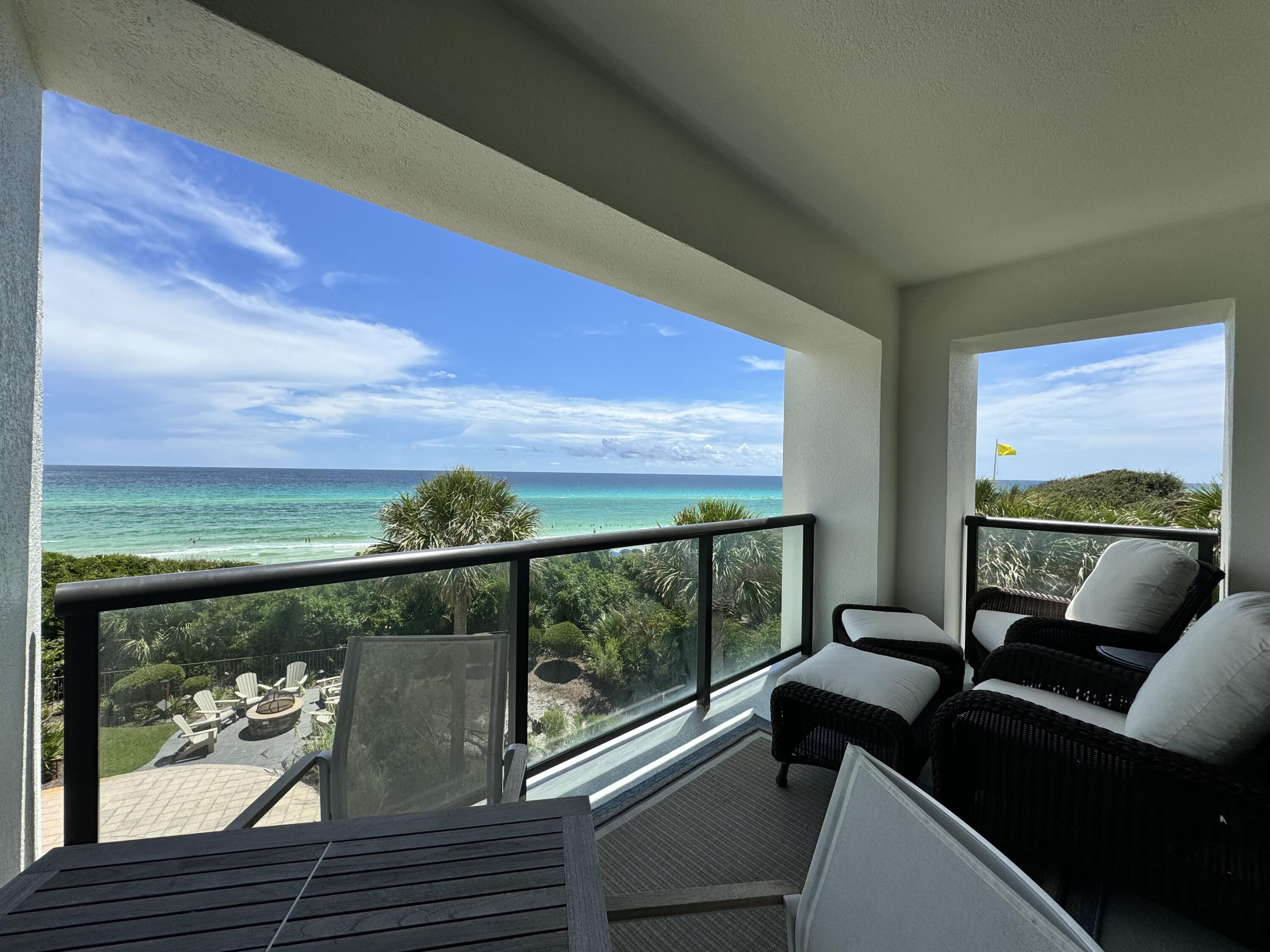 a view of balcony with furniture