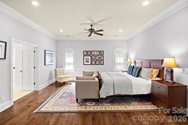 a living room with furniture a rug and a fireplace