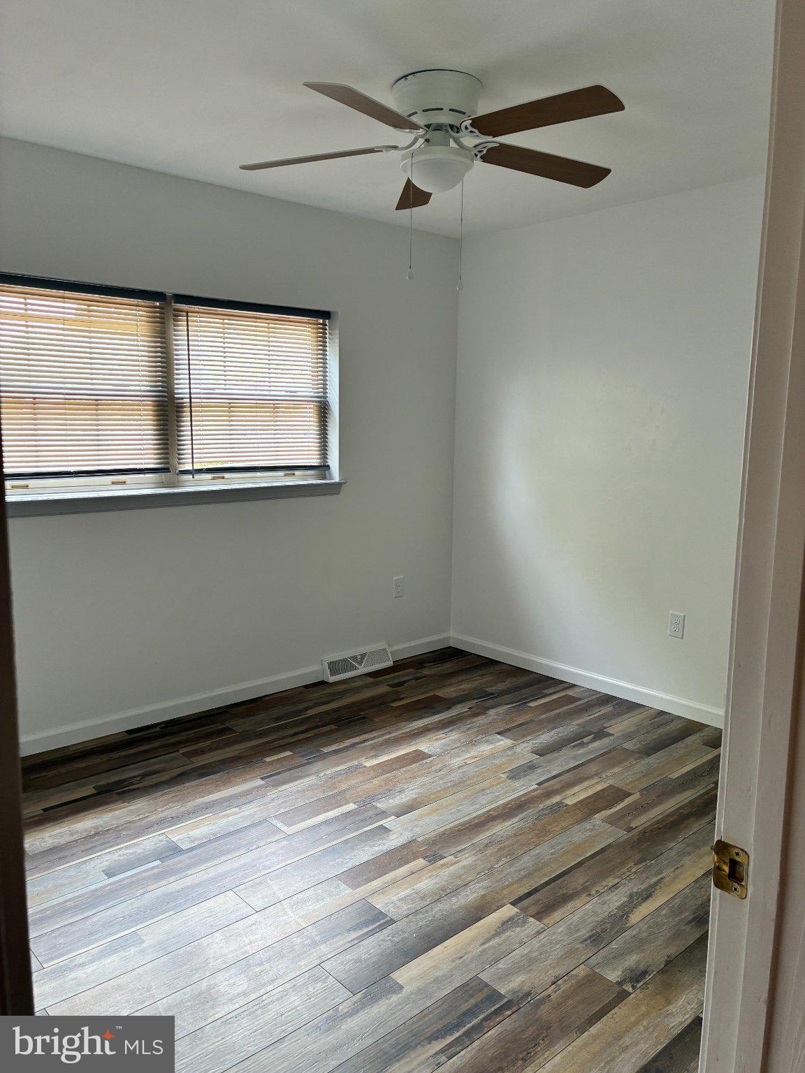 3121 Sundial Road Dover, PA 17315 - Photo 19 of 32 Bright and airy room with wood floors.