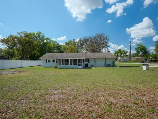 a view of a house with a big yard