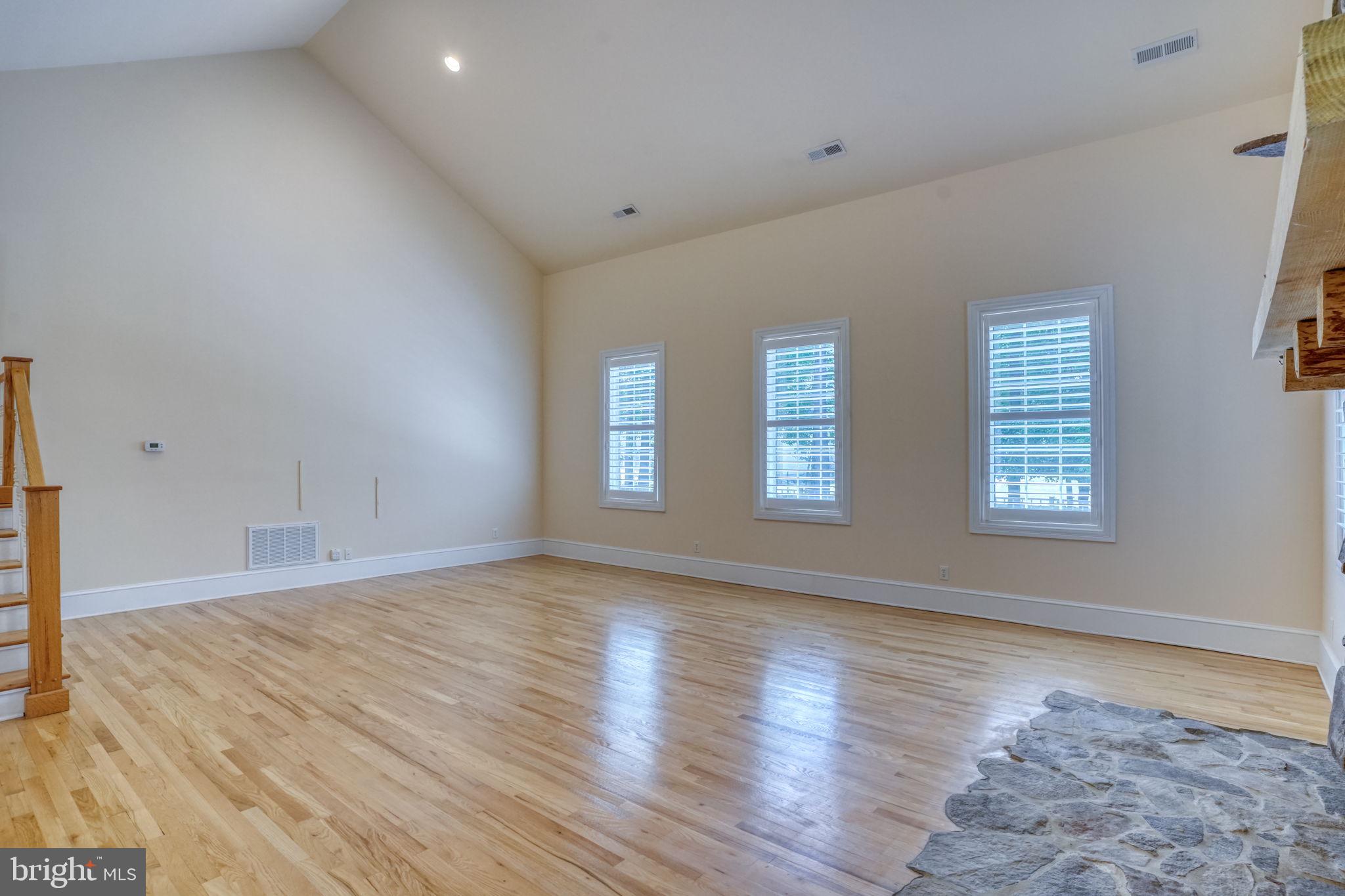 20064 Shingle Point Road Georgetown, DE 19947 - Photo 30 of 77 Great Room with Hickory hardwood flooring