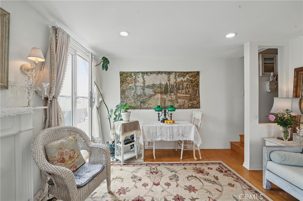 1 Jib Street, Unit 103 Marina del Rey, CA 90292 - Photo 10 of 26 a living room with furniture and a window