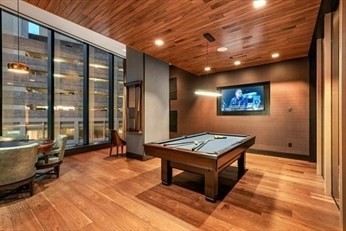 1 Franklin Street, Unit 5105 Boston, MA 02110 - Photo 18 of 24 a room with gym equipment and a table