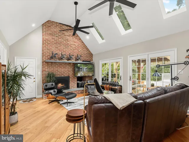 a kitchen with a stove top oven and cabinets