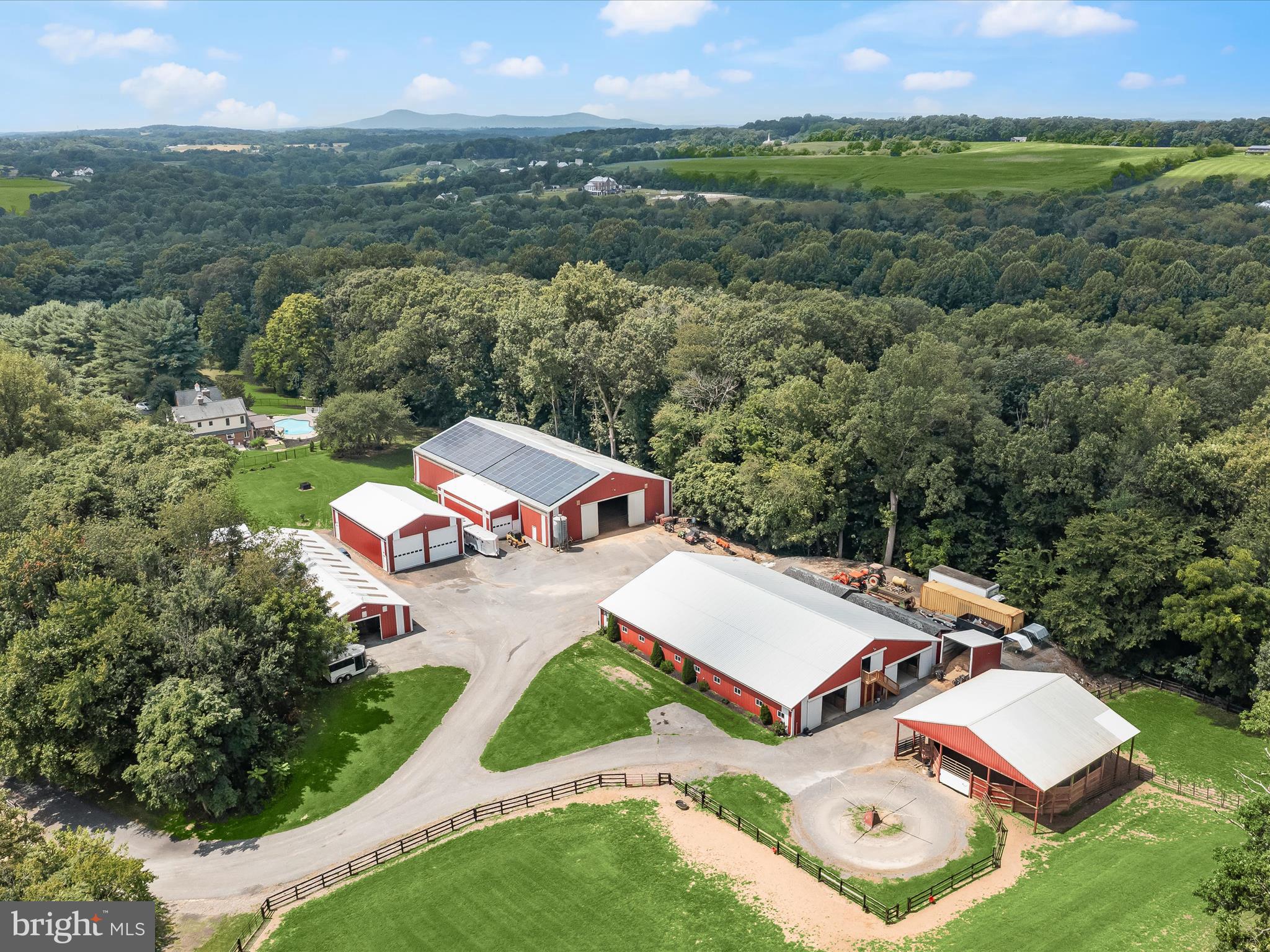 10901 Moxley Road Damascus, MD 20872 - Photo 136 of 148 an aerial view of a house with a garden