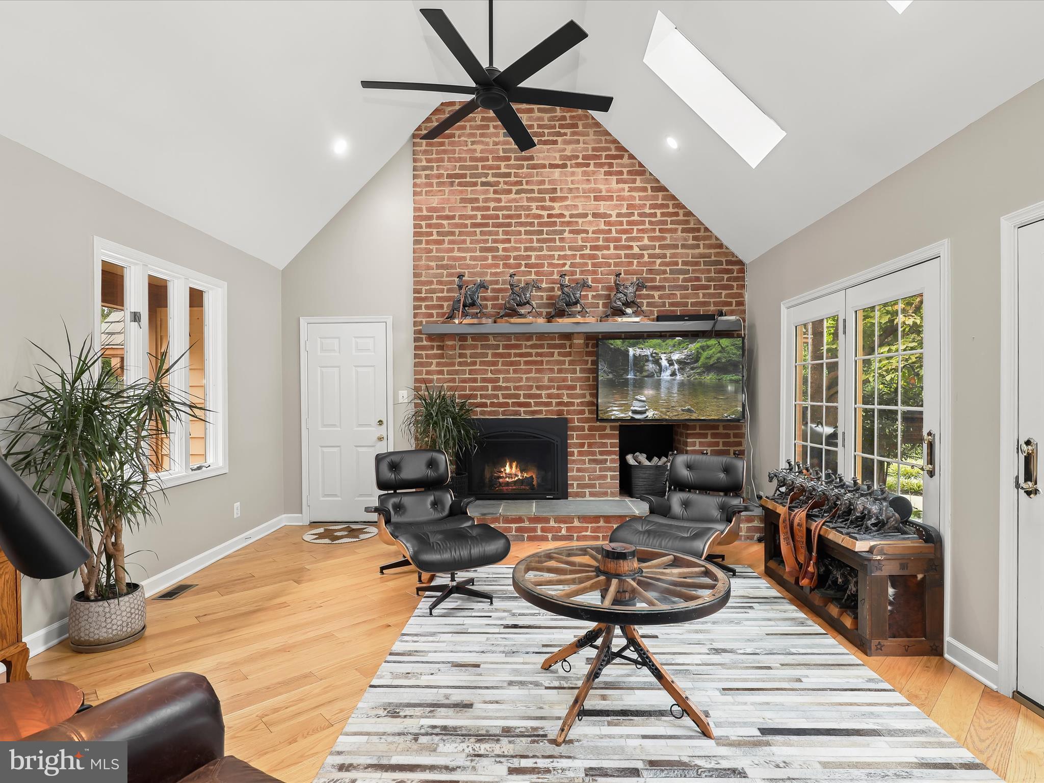 10901 Moxley Road Damascus, MD 20872 - Photo 14 of 148 a living room with furniture and a fireplace