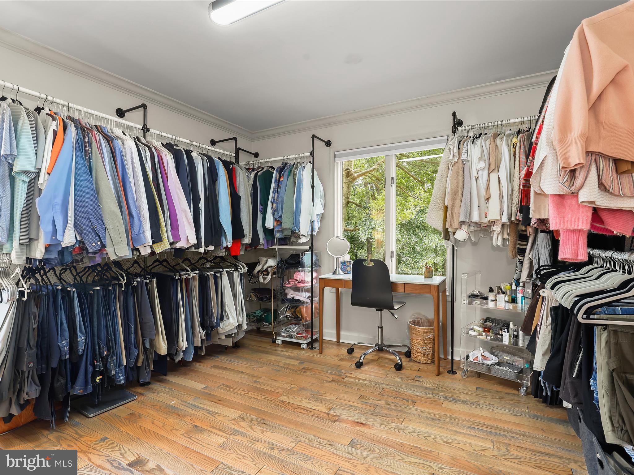 10901 Moxley Road Damascus, MD 20872 - Photo 35 of 148 a view of walk in closet with clothes and shoes