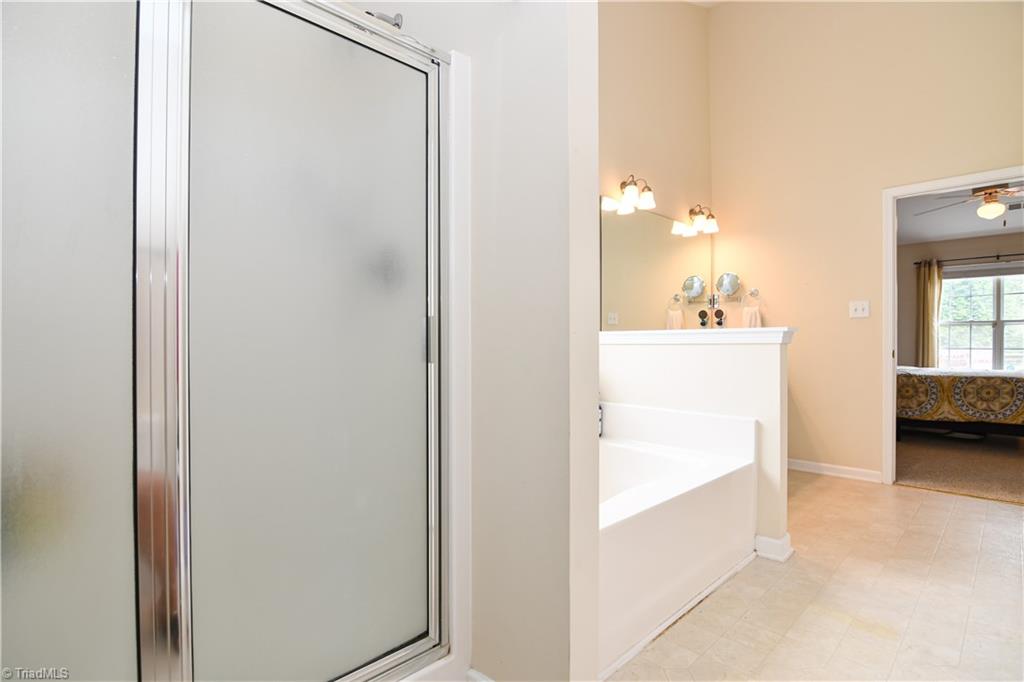 4700 Ridge Fall Road Greensboro, NC 27410 - Photo 14 of 23 The shower is extra roomy.
