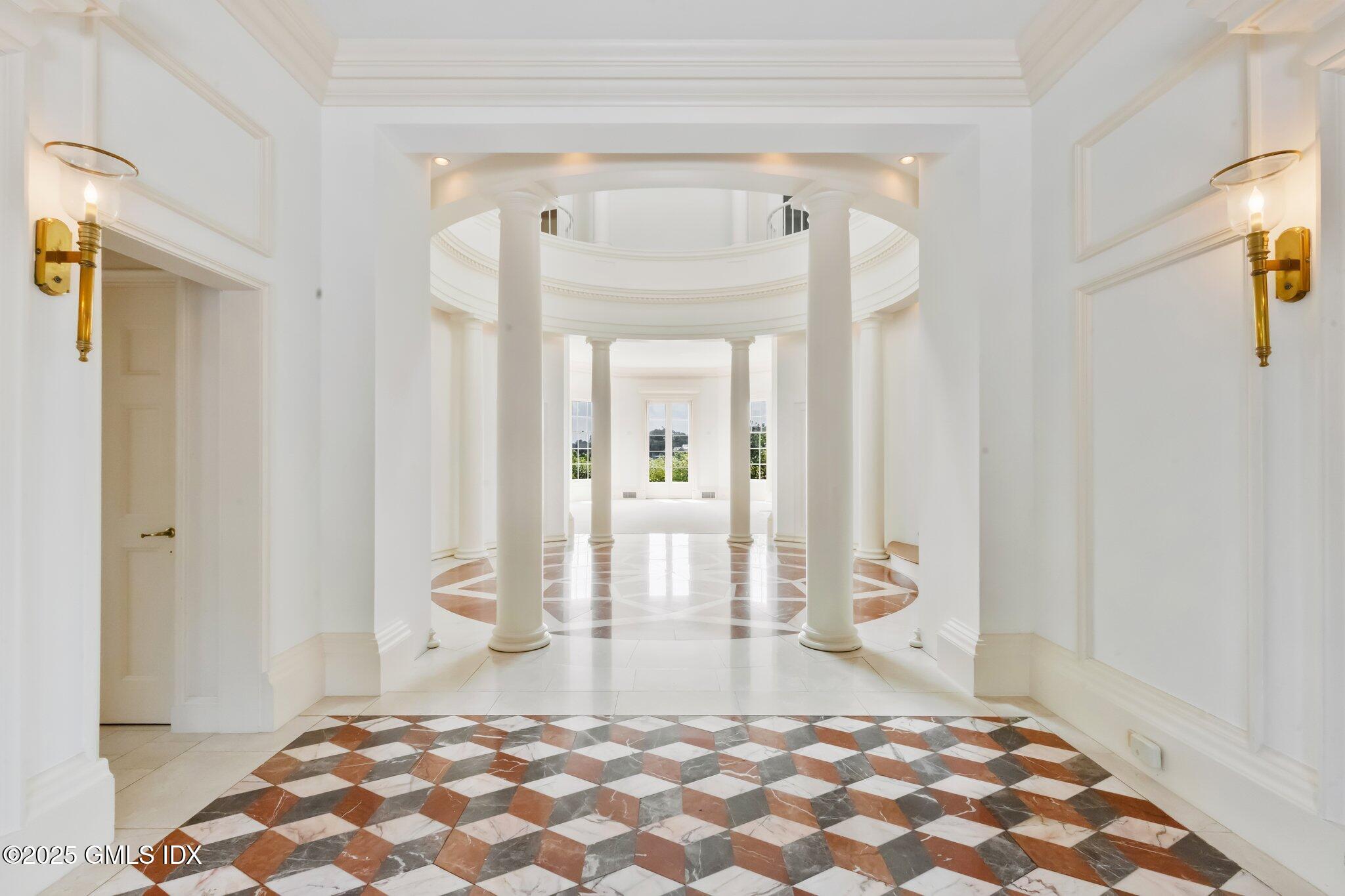 16 Windrose Way Greenwich, CT 06830 - Photo 4 of 18 a bedroom with a bed and a mirror on the dresser