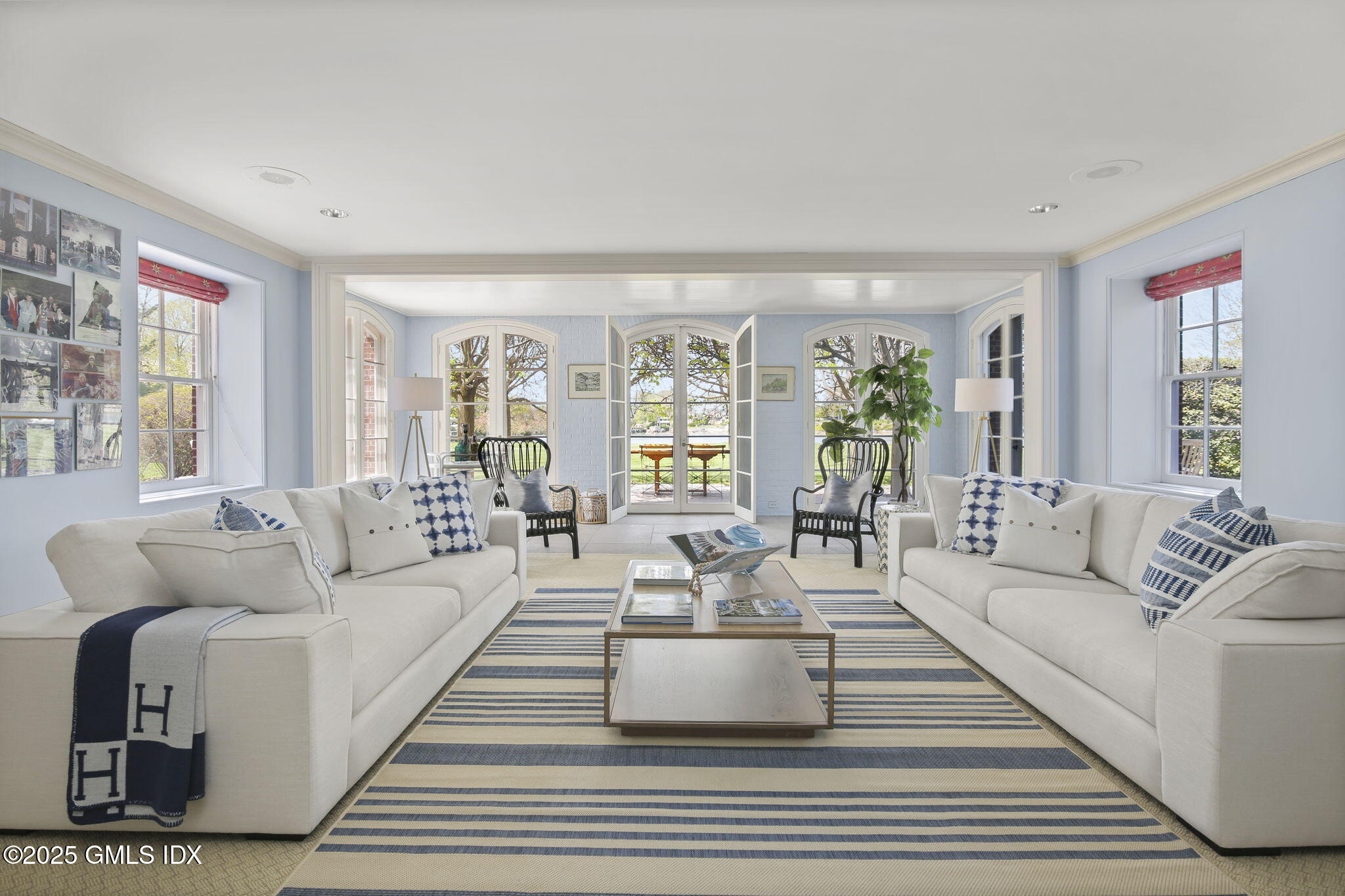 16 Windrose Way Greenwich, CT 06830 - Photo 8 of 18 a living room with furniture and a large window