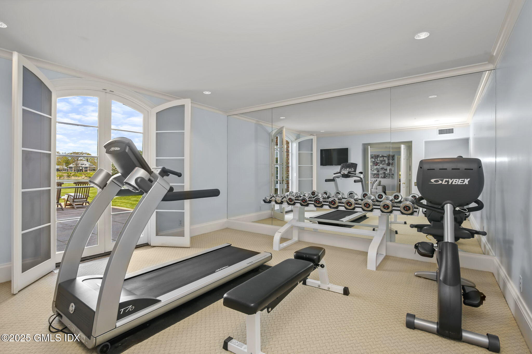 16 Windrose Way Greenwich, CT 06830 - Photo 10 of 18 a view of a room with gym equipment