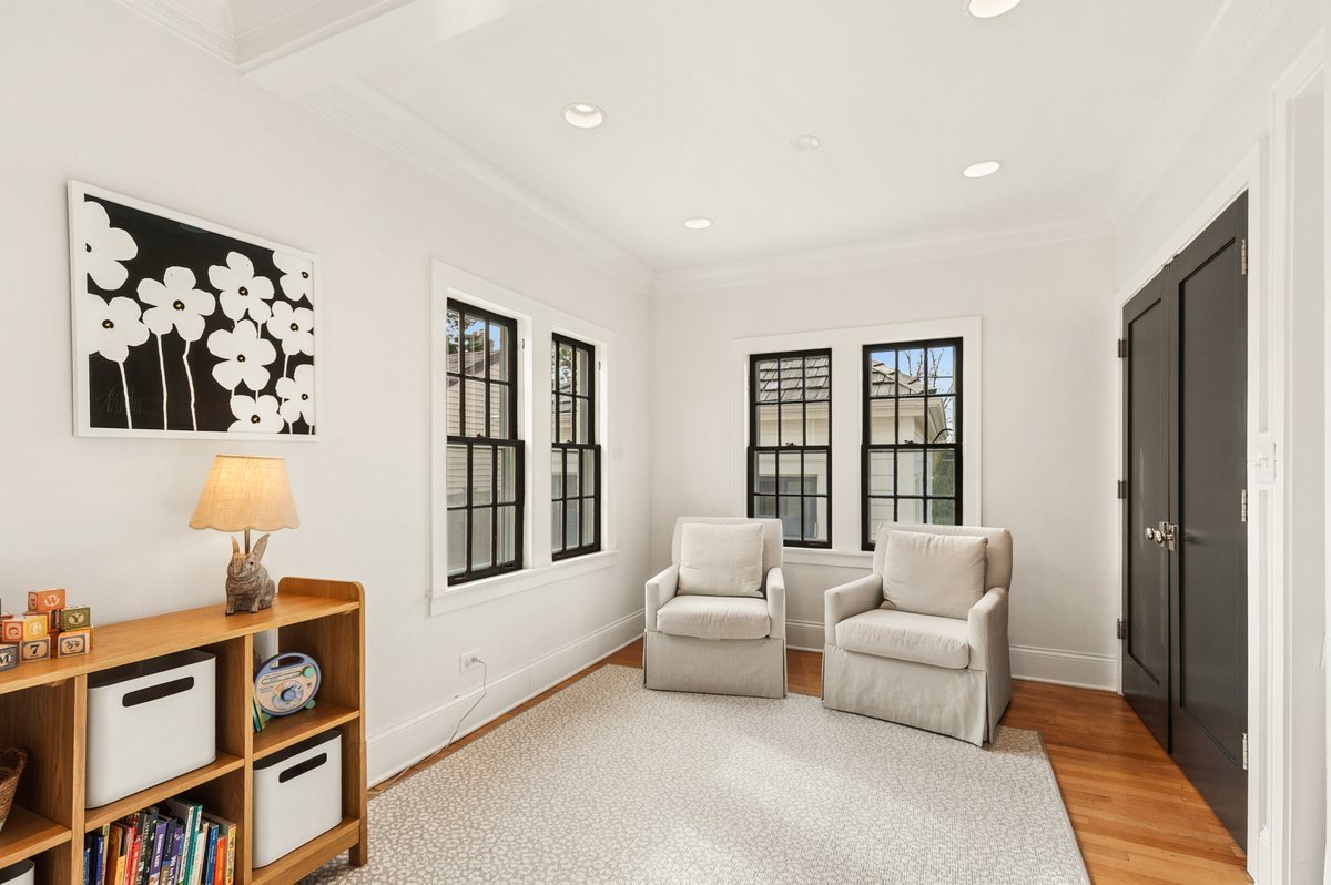 240 West St Charles Road Elmhurst, IL 60126 - Photo 12 of 41 a living room with furniture and a window