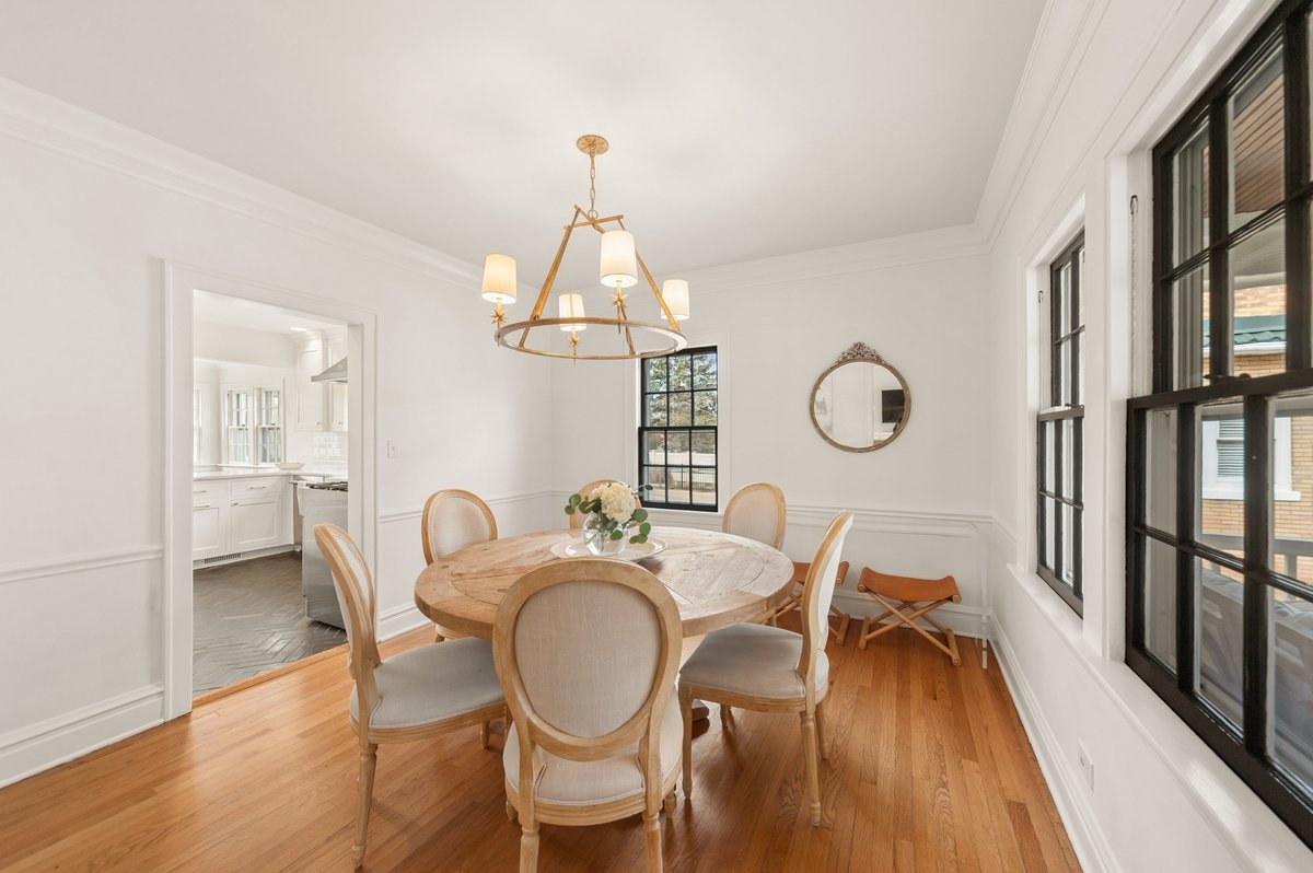 240 West St Charles Road Elmhurst, IL 60126 - Photo 21 of 41 a view of a dining room with furniture wooden floor and chandelier